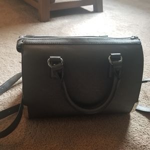 Bag, gray or silver in color, excellent condition, approx size 12Lx10Hx7D